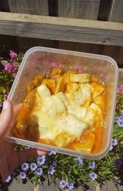 ravioli, cheese, flowers and fence